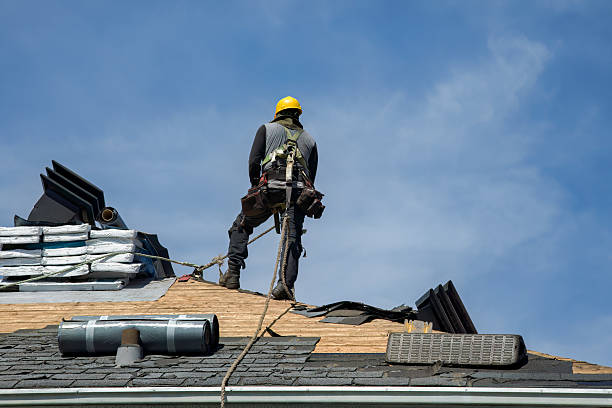 Professional Gutter Installation technician working in Monroe Bridge, MA